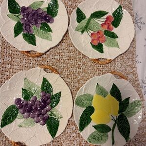 Vintage  majolica set of four fruit plates